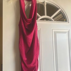 Magenta halter top dress that goes down to your knees.